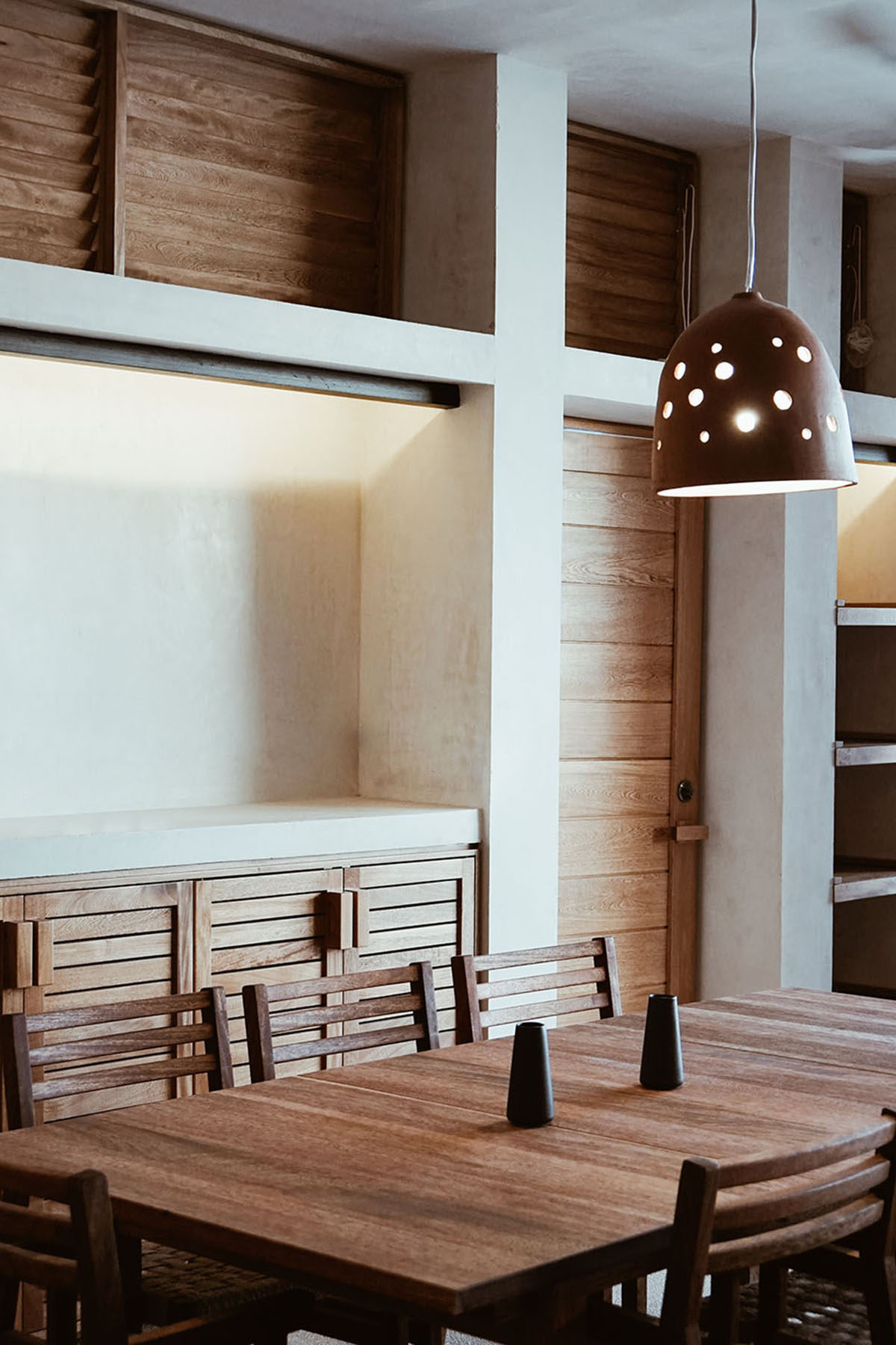 Francisco Pardo Arquitecto's housing features circular  pool overlooking the coastal landscape