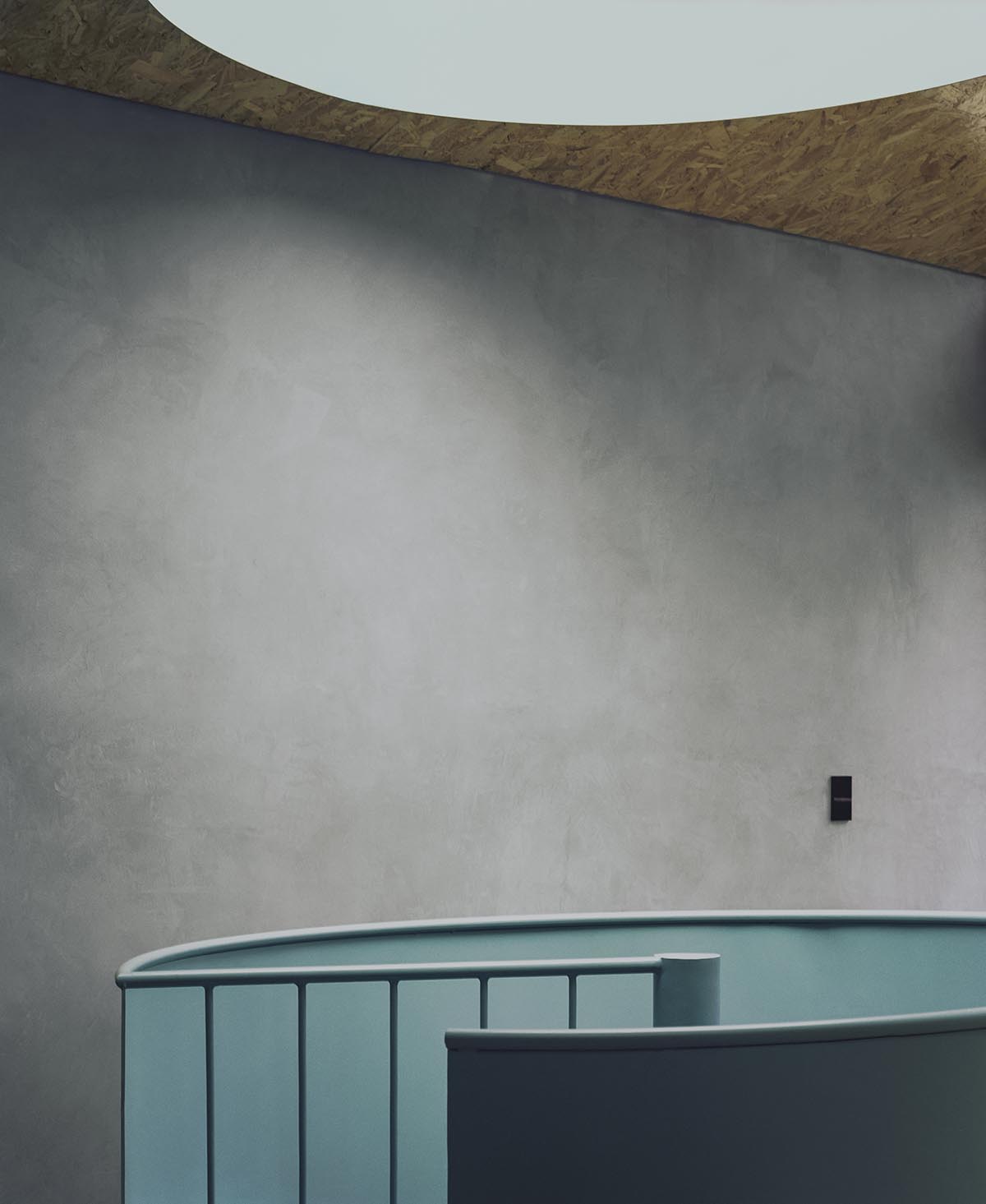 AMASA Estudio renovates 1940s house with green tones and central skylight in Mexico