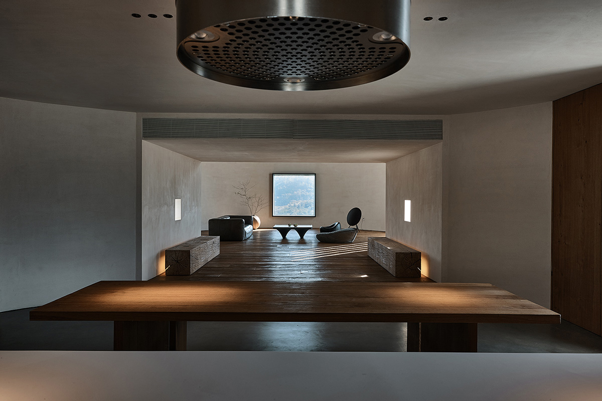 ZMY Design creates earth-toned interiors for a woodwork enthusiast’s house in Fujian, China