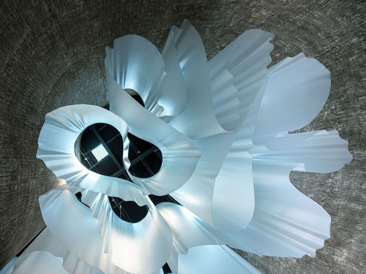 Smooth all-white walls form church designed by Mario Cucinella Architects in Mormanno hill town 