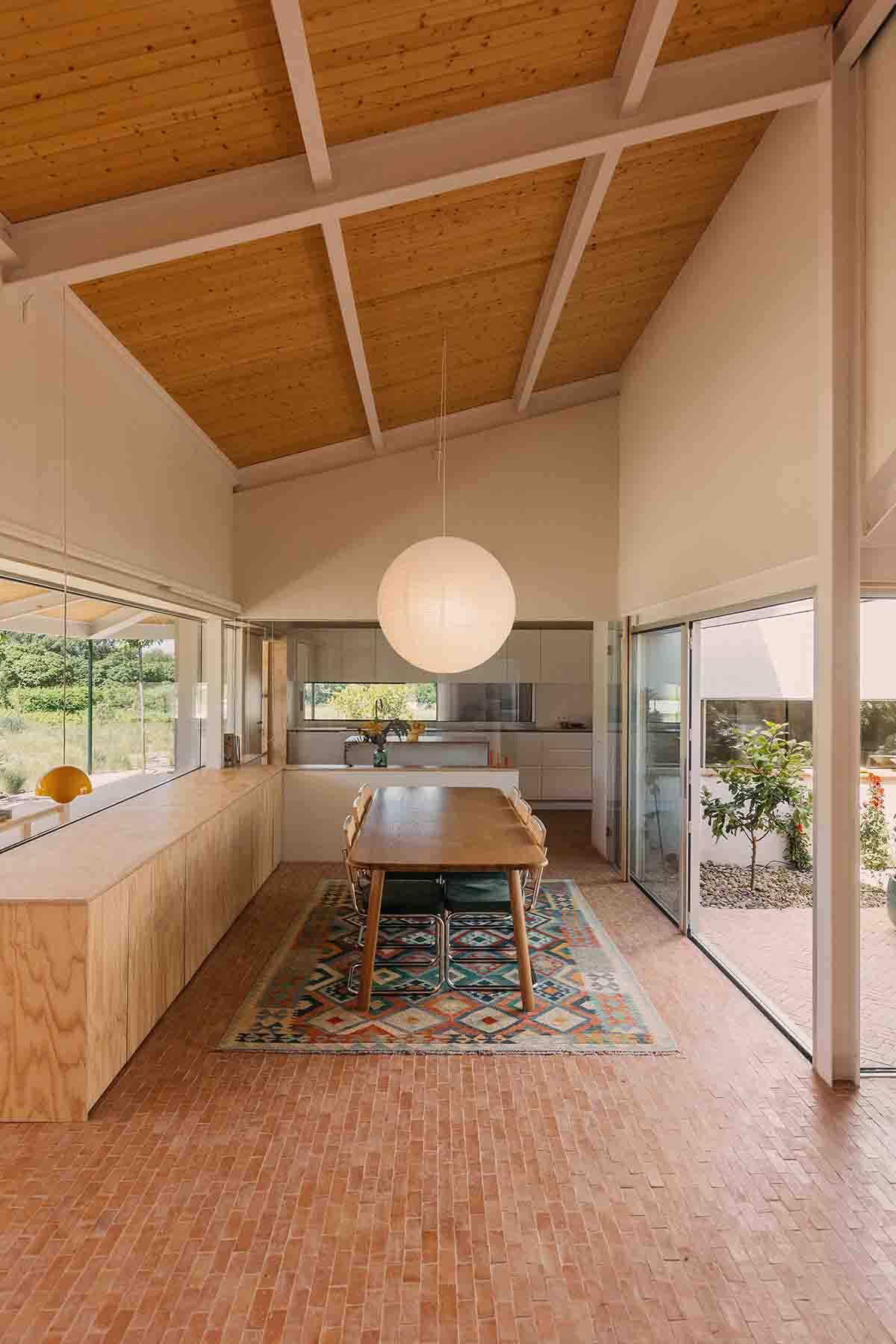 This house interacts with light and space, dimming to create a harmonious architectural experience