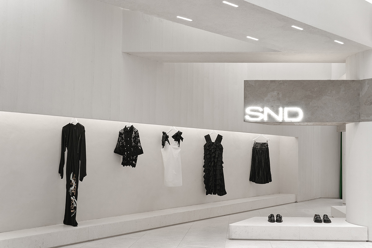 Boutique fashion store by Various Associates is inspired by remaining ancient temples in deserts