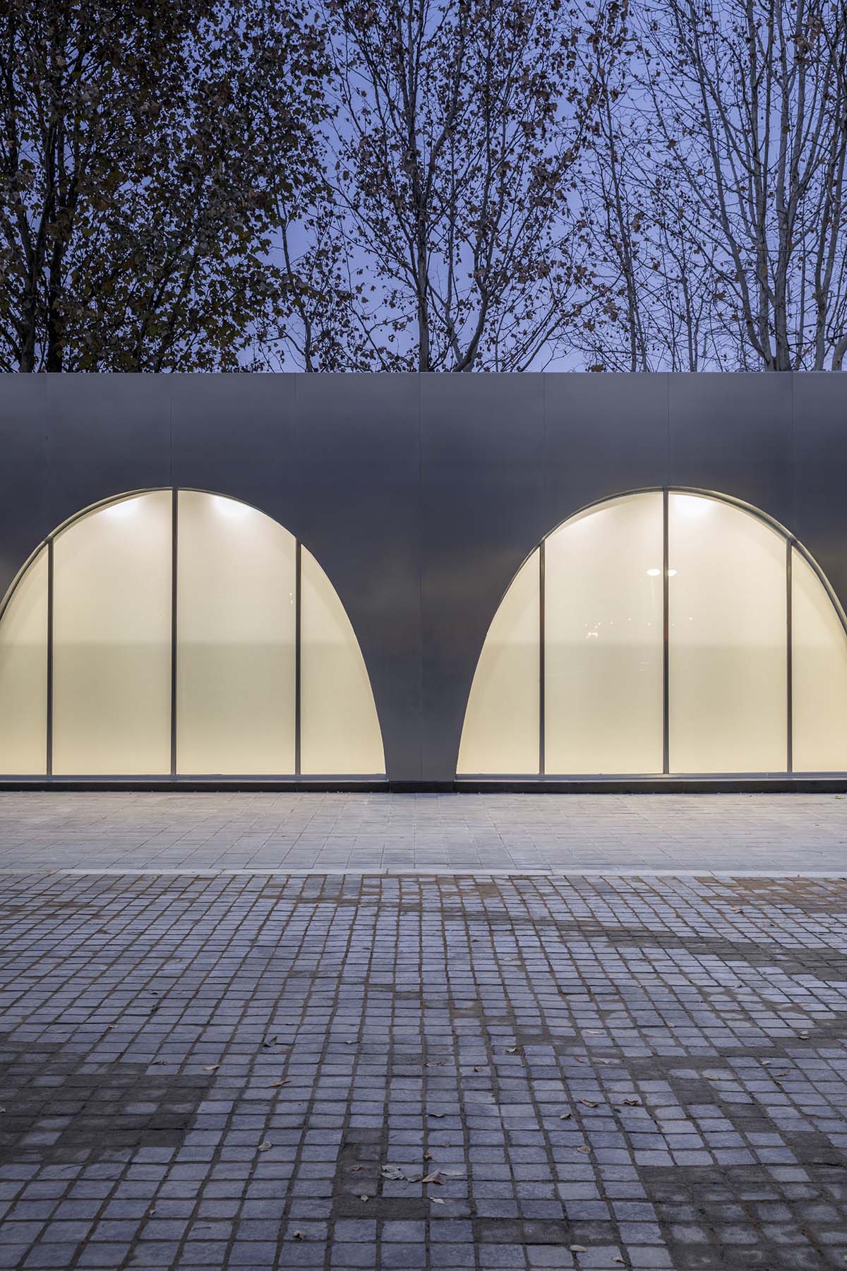 TEMP designs runner's station with stainless steel arcades in Beijing Olympic Forest Park