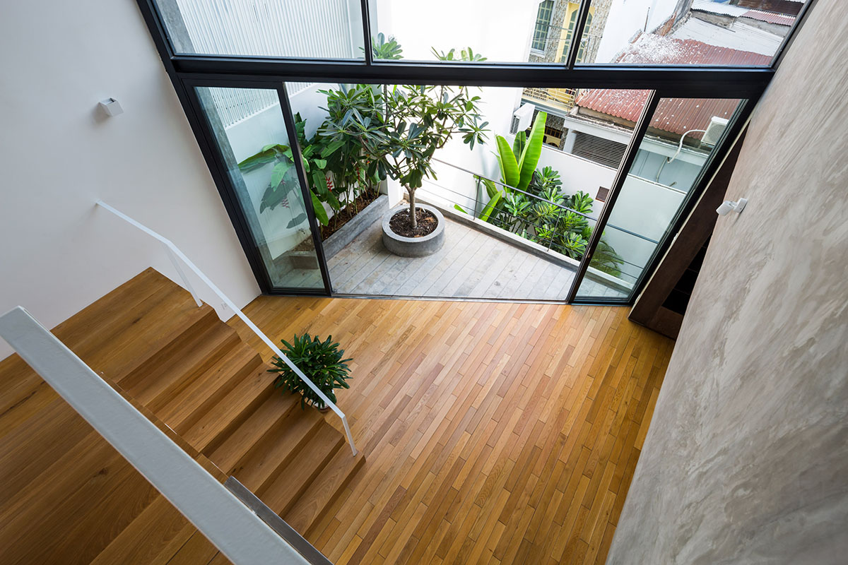 Sanuki Daisuke Architects' multifaceted concrete house features more open spaces in Vietnam