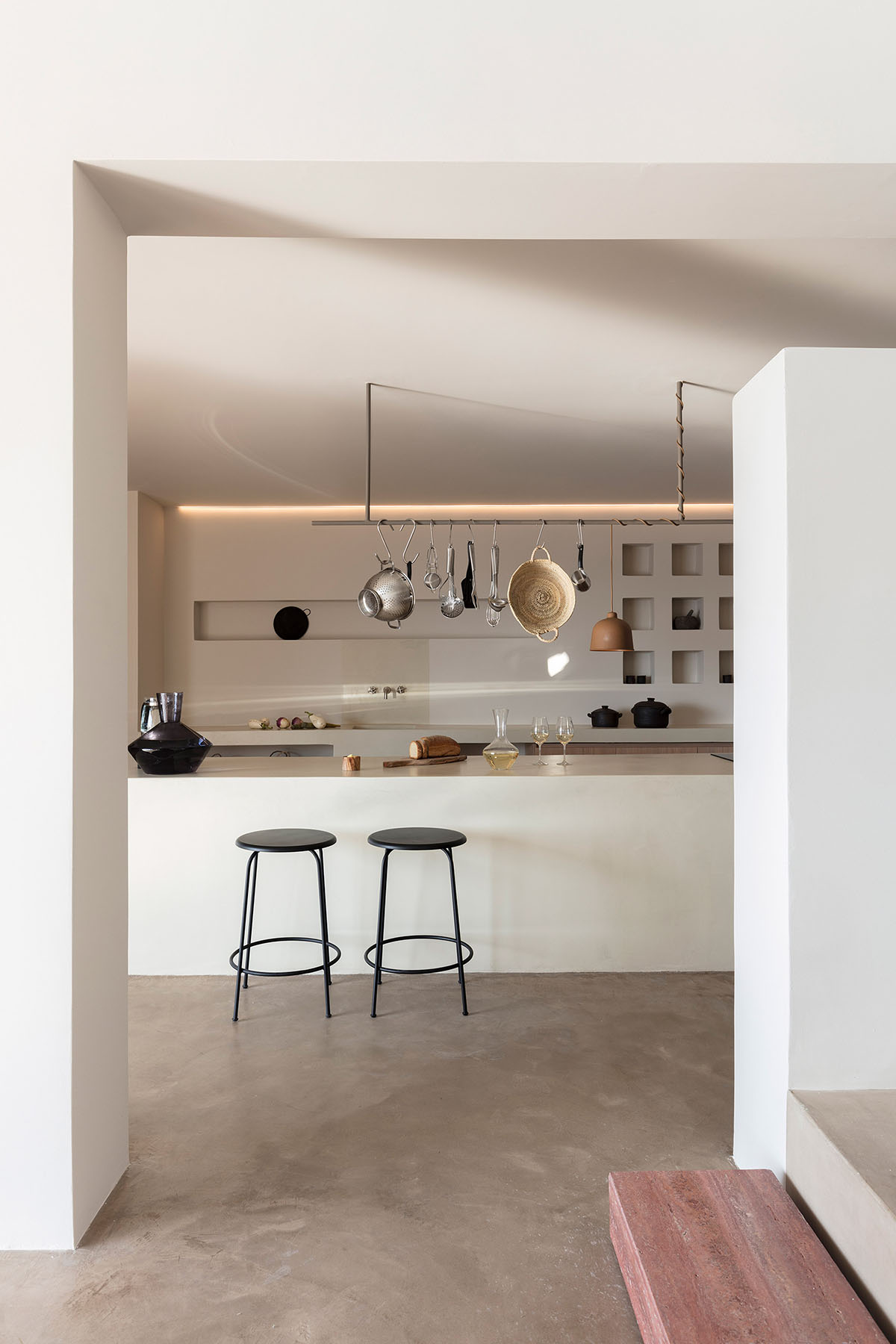 Kapsimalis Architects adds this summer villa featuring orthogonal lines to the Santorini Island