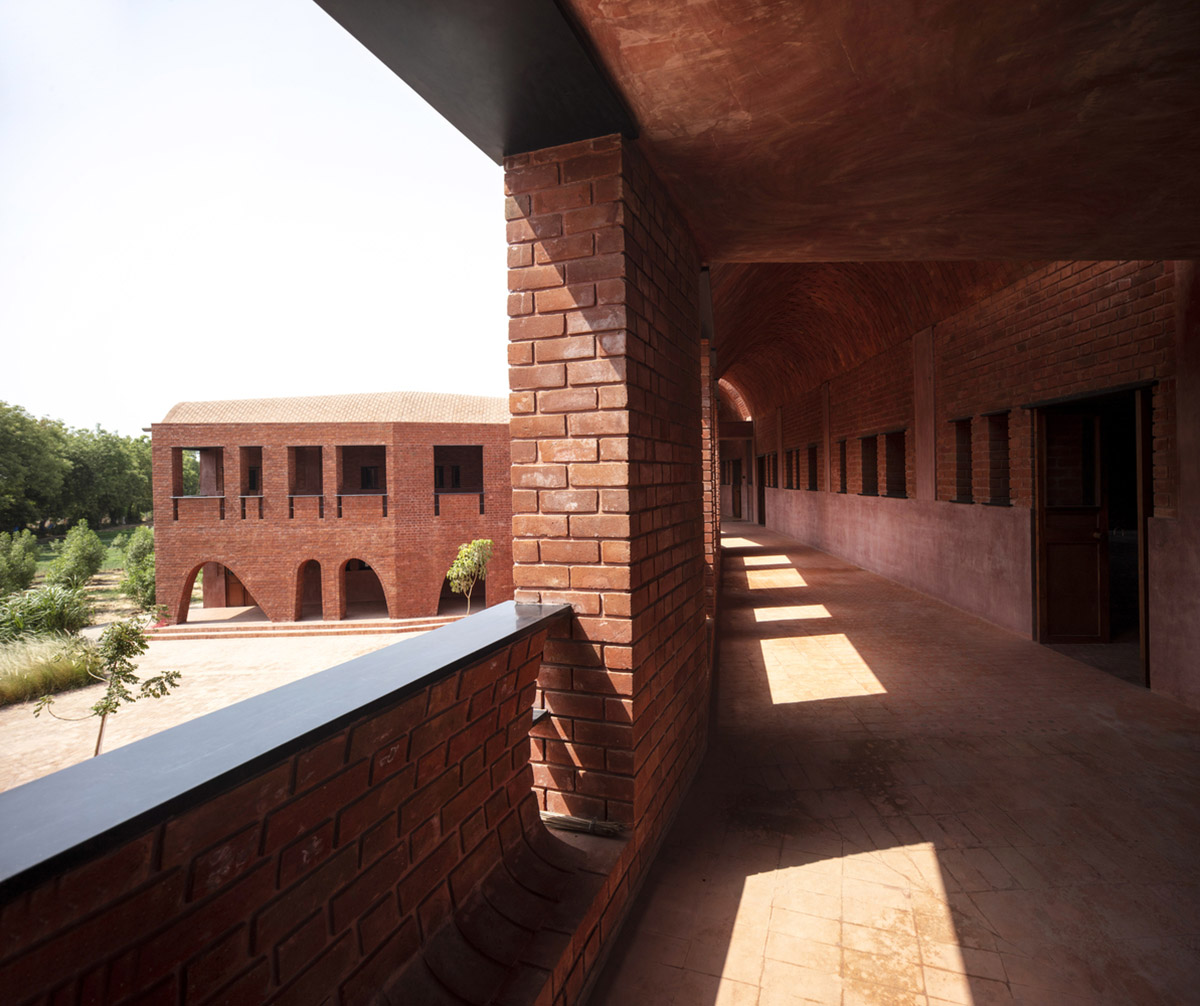 A school built from tilted brick vaults evoke a child's freedom in India