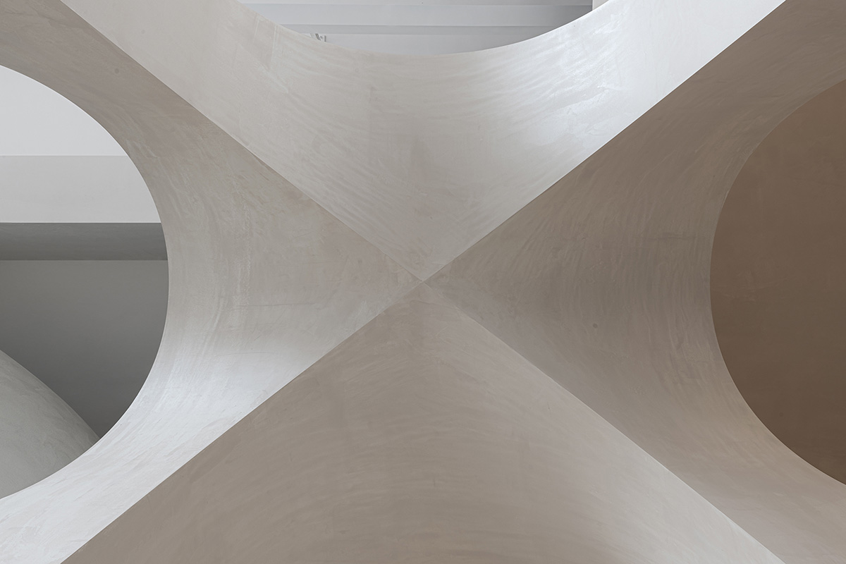EVD designs its office that features classical aesthetics with arched elements in Shanghai
