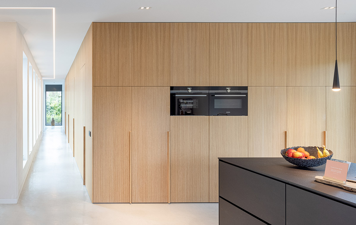 RoosRos Architecten completes black wooden-clad family house in an old orchard in Nieuw-Beijerland