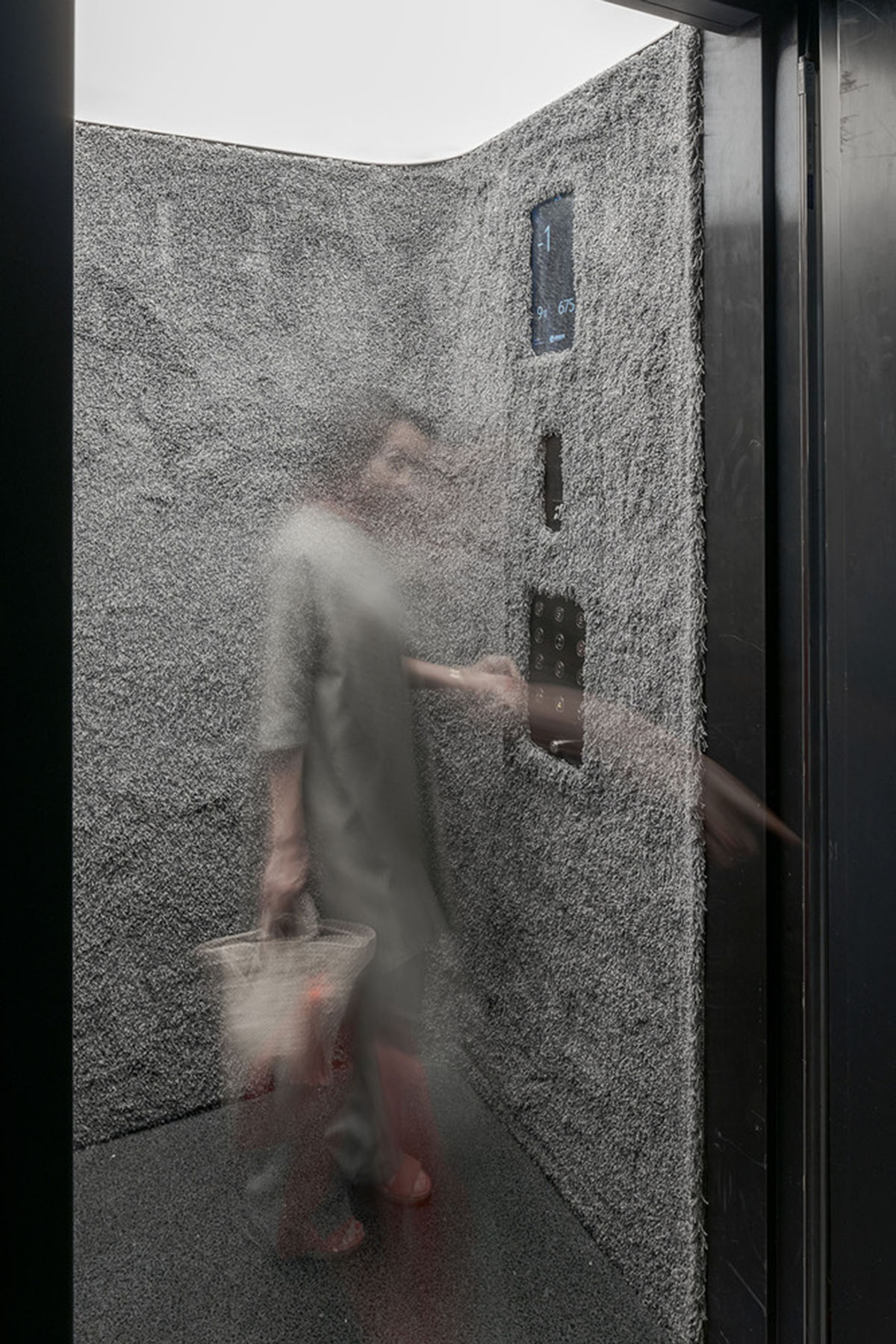 Kengo Kuma and Associates designs metal curtain with shades of grey at the atrium of Casa Batlló
