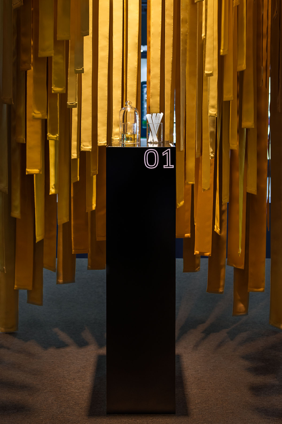 MEAN* reveals cathedral-like pavilion with lightweight fabric strips at Dubai's World Trade Center