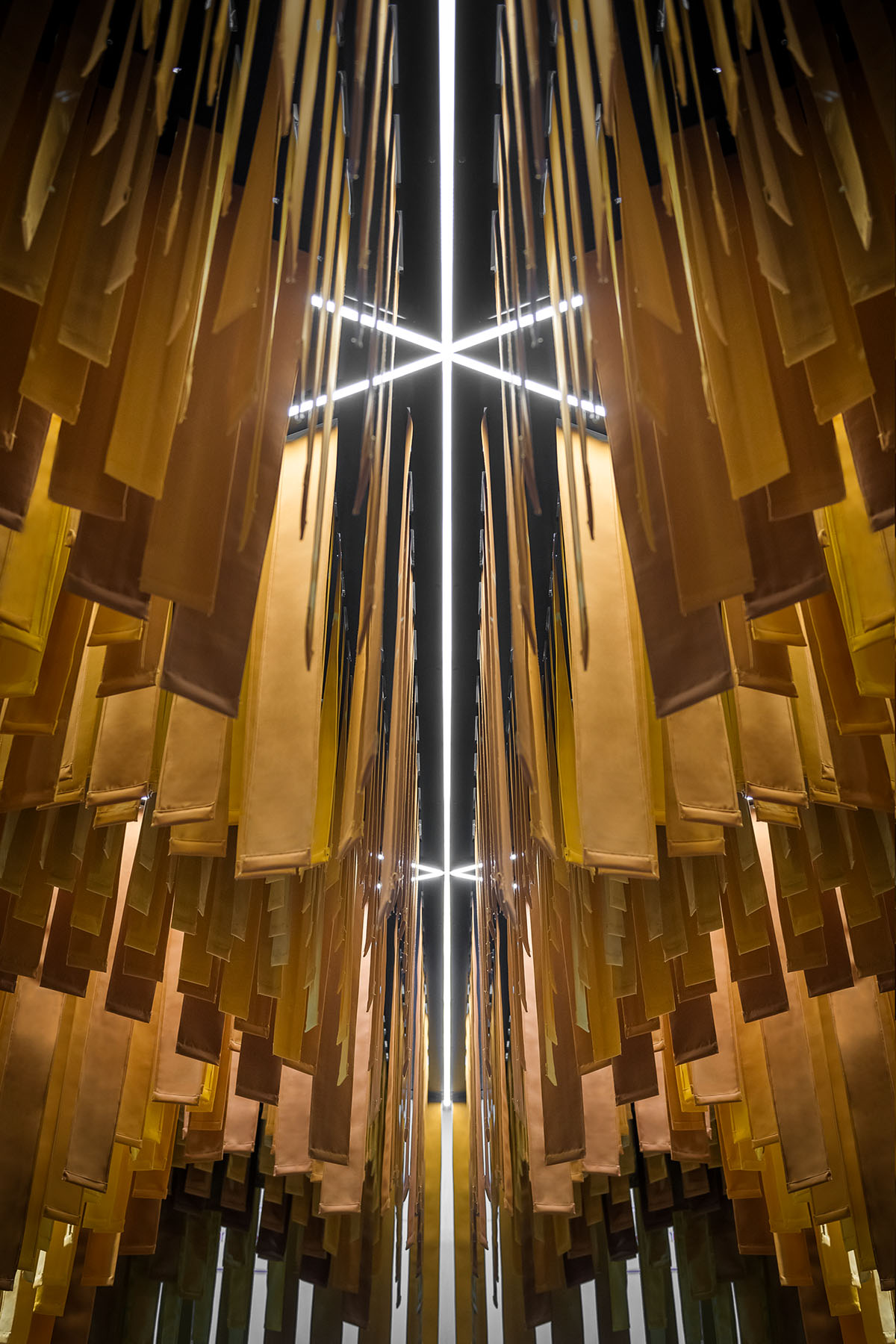 MEAN* reveals cathedral-like pavilion with lightweight fabric strips at Dubai's World Trade Center