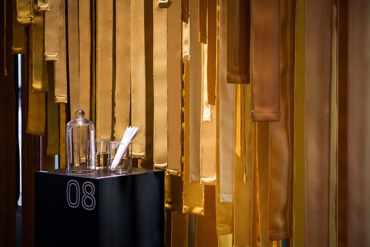 MEAN* reveals cathedral-like pavilion with lightweight fabric strips at Dubai's World Trade Center