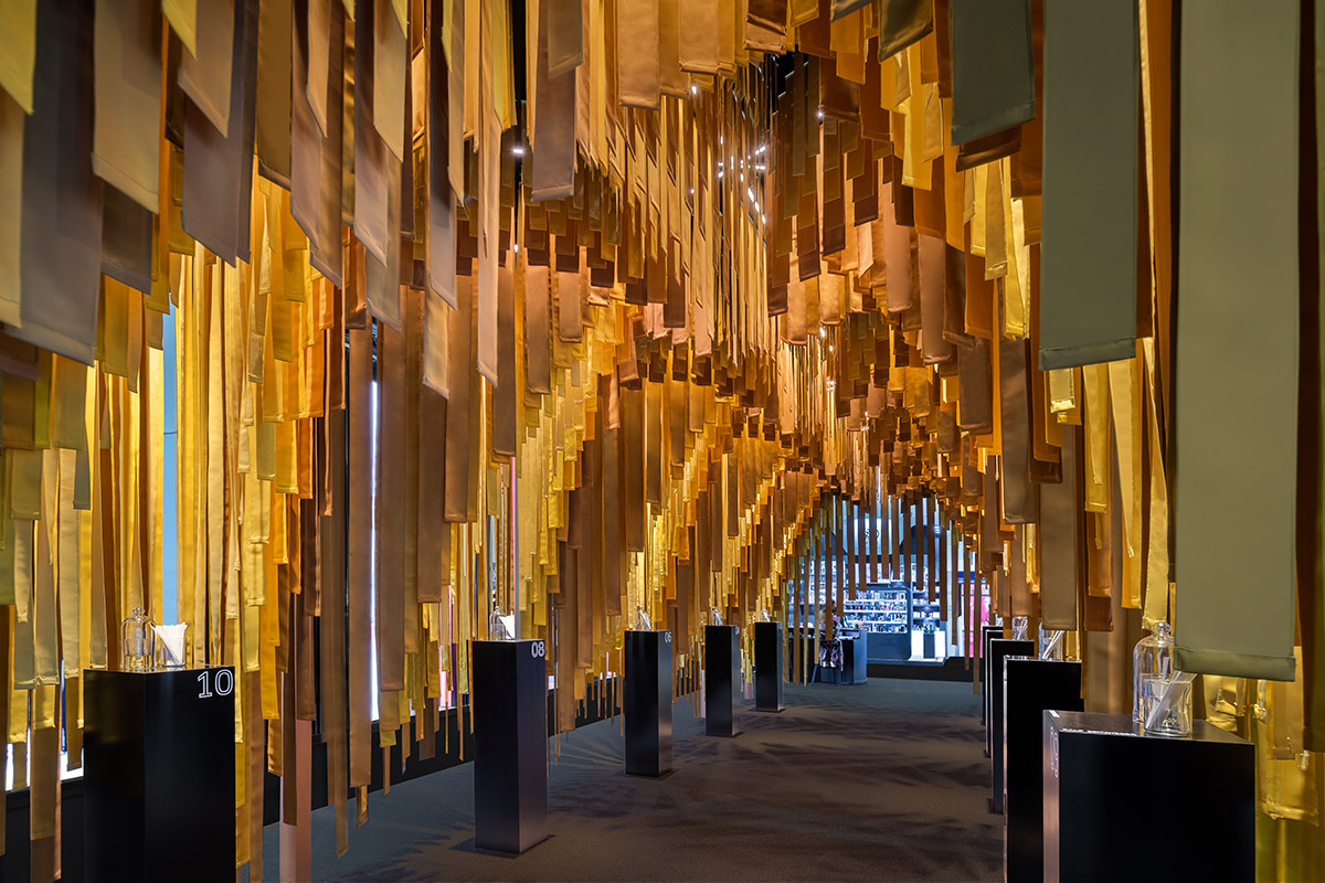 MEAN* reveals cathedral-like pavilion with lightweight fabric strips at Dubai's World Trade Center