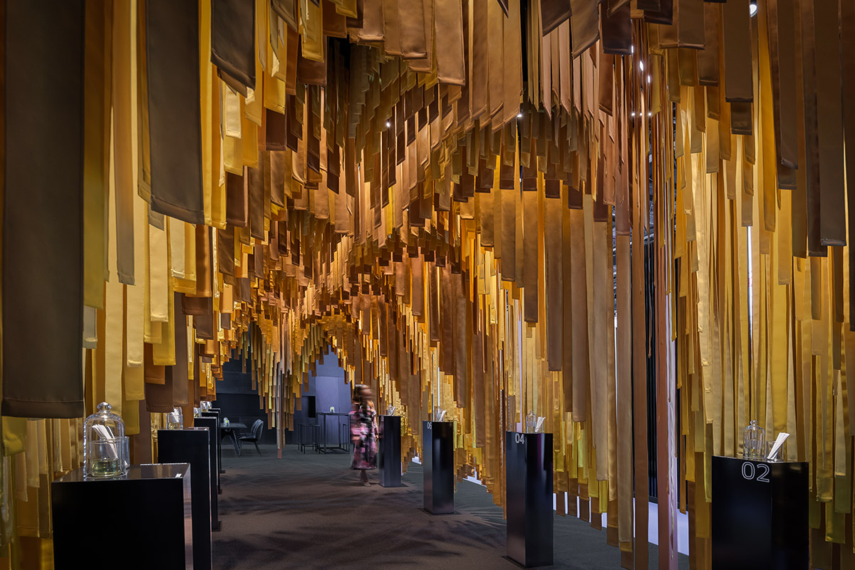 MEAN* reveals cathedral-like pavilion with lightweight fabric strips at Dubai's World Trade Center