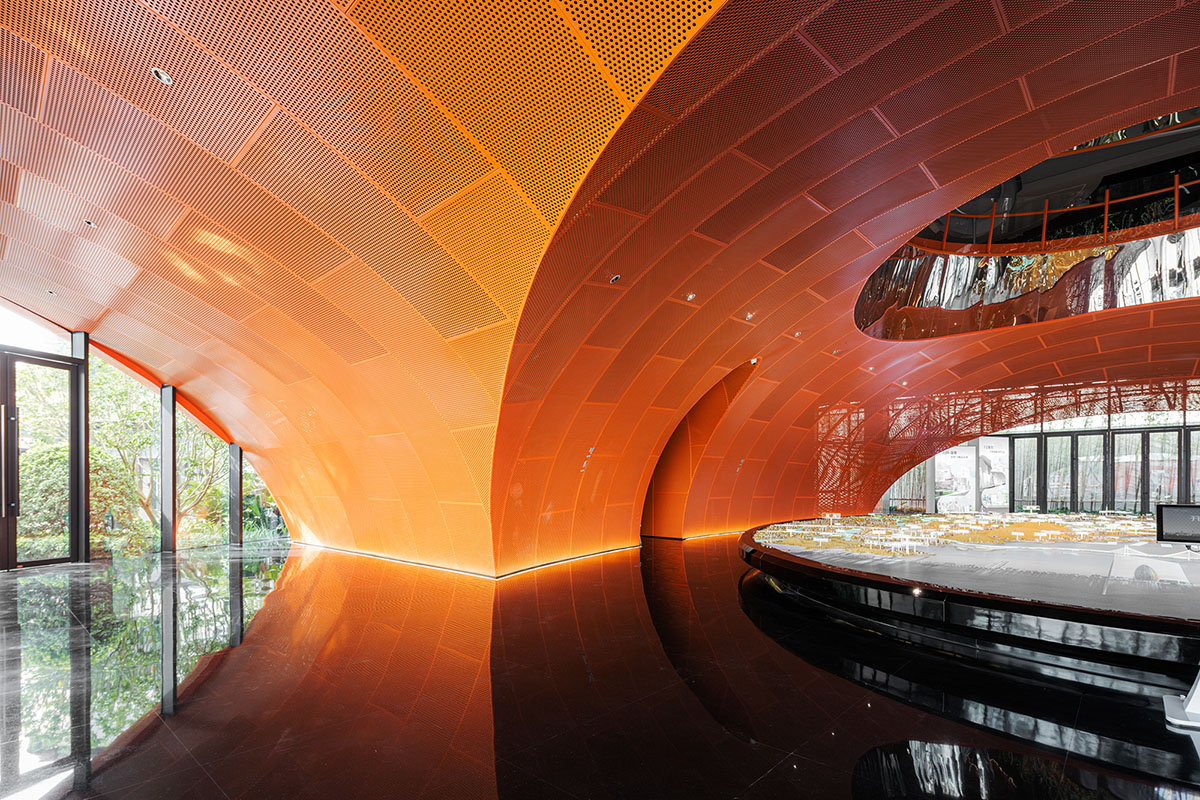Wutopia Lab built showroom evoking Chinese red mountains with dazzling orange-colored roof