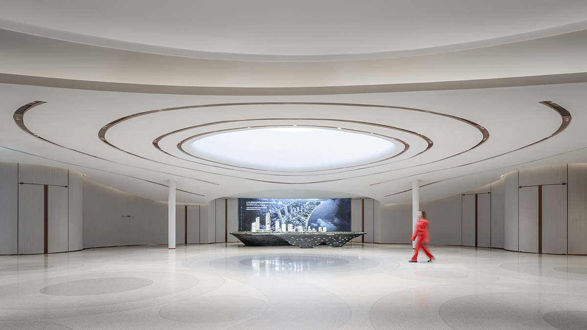 Undulating lines and expansive waves define interior of Orbit public exhibition hall in Shanghai 