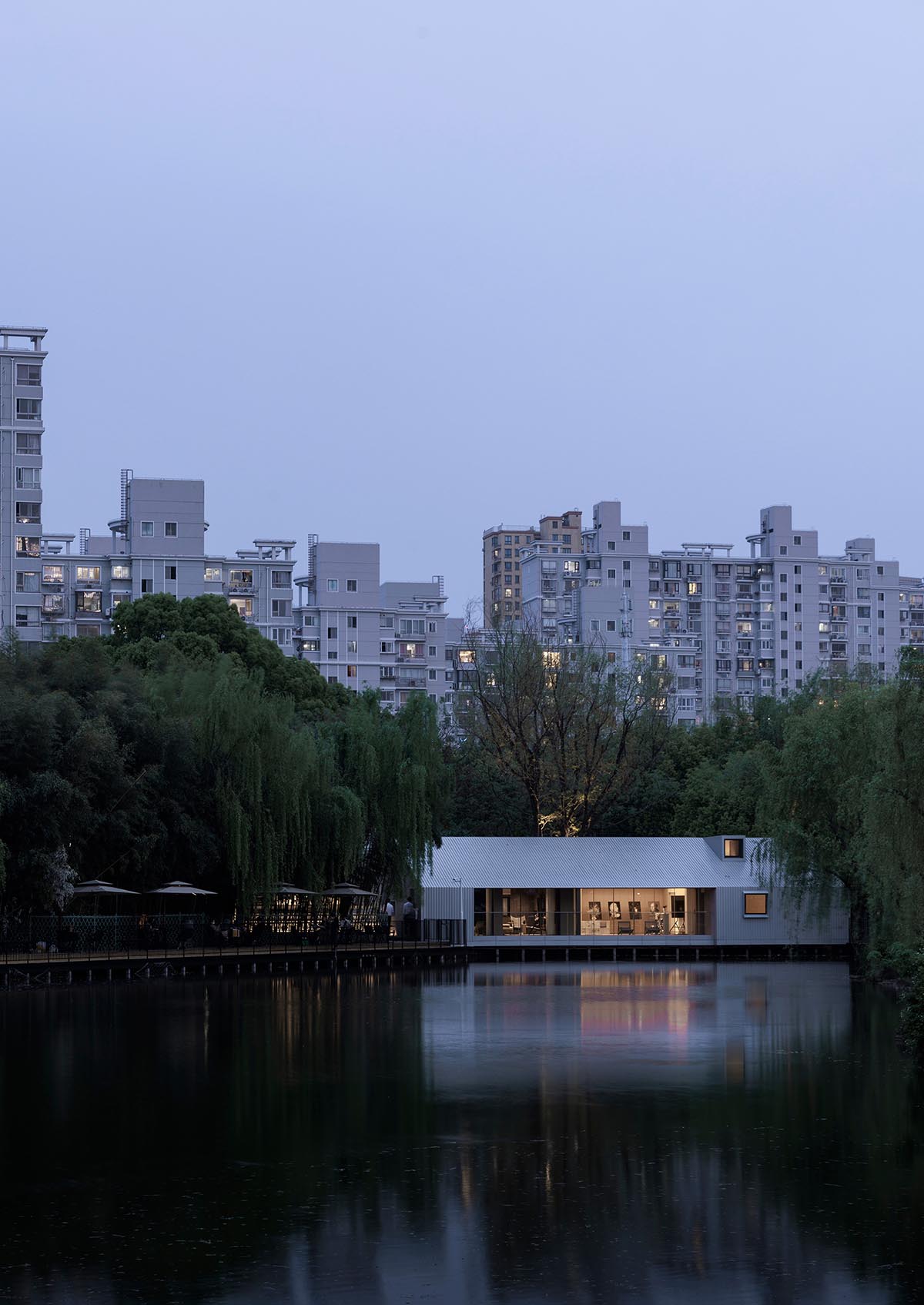 Wutopia Lab creates a glimmer of light in enchanting green with The Lake House in Shanghai 