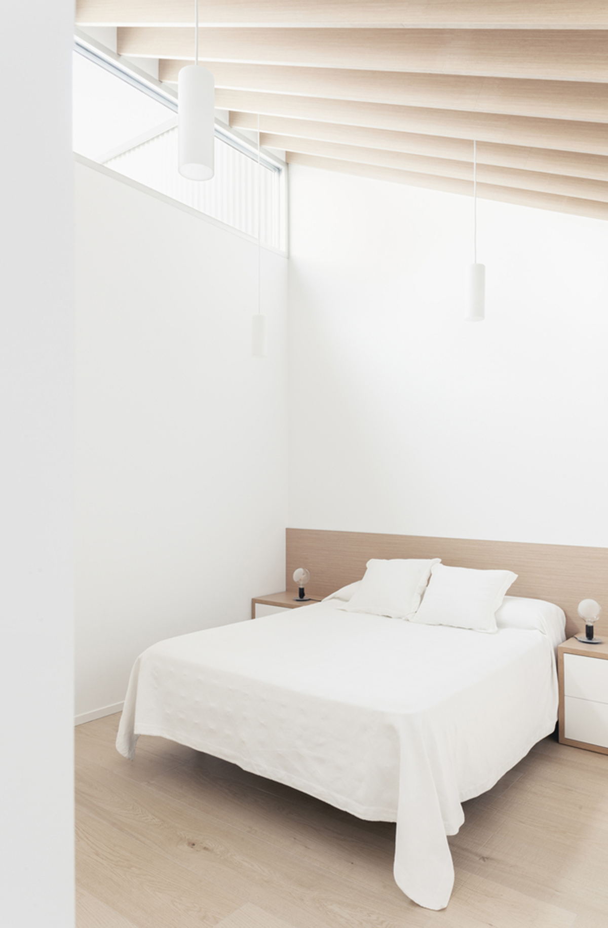 Pablo Muñoz Payá Arquitectos renovates former house with wooden shutters in Spain