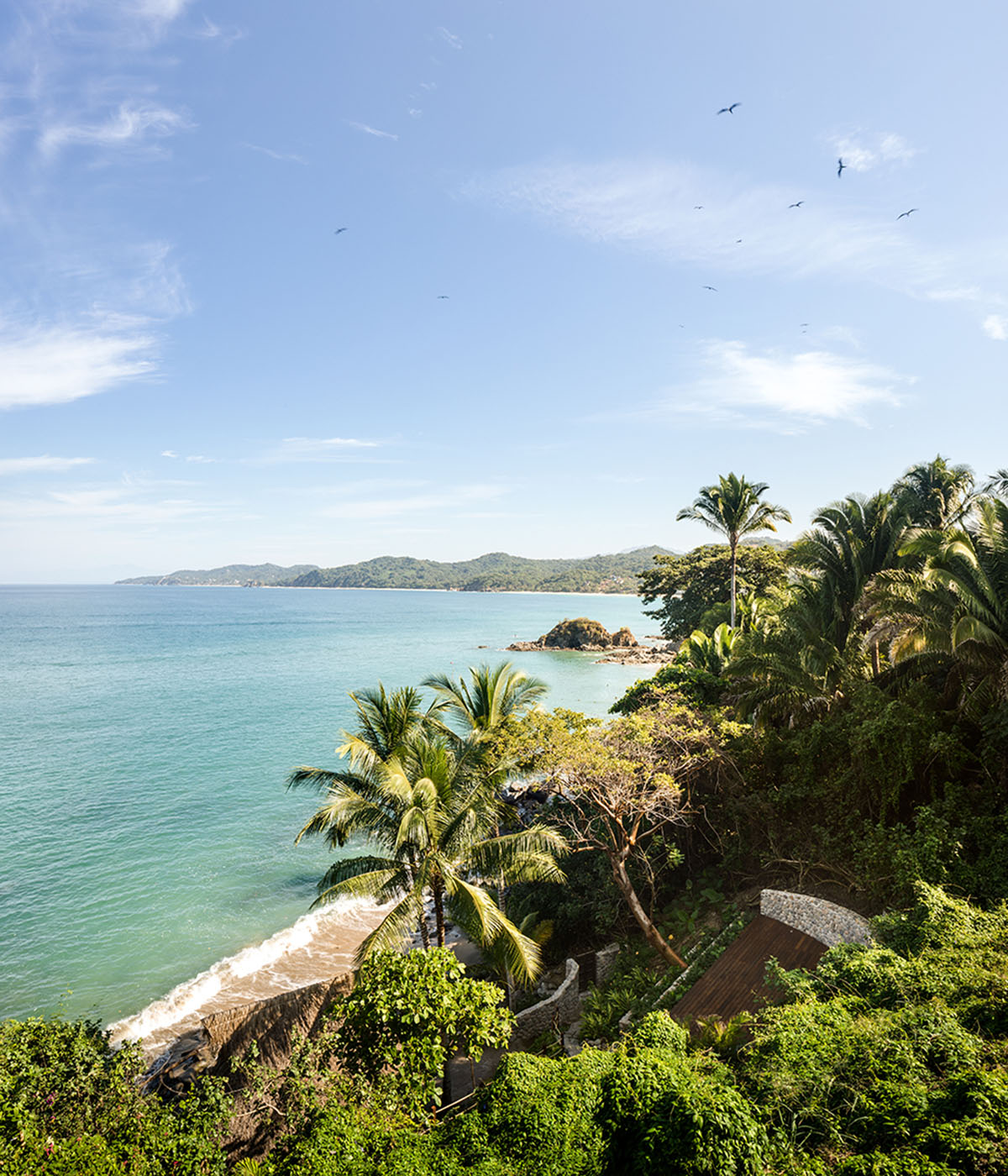 MAIN OFFICE adds half-circle yoga platform to thatched-roof guest villas in Sayulita, Mexico