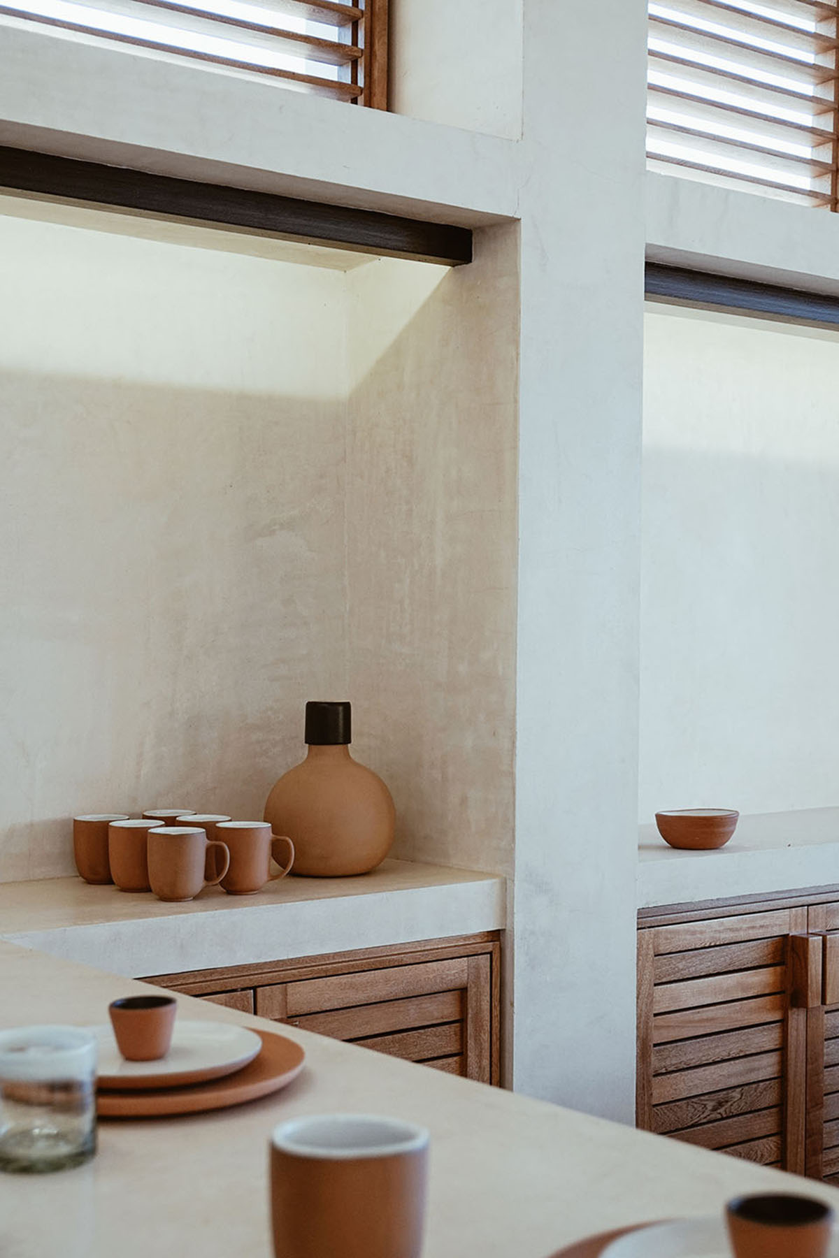 Francisco Pardo Arquitecto's housing features circular  pool overlooking the coastal landscape