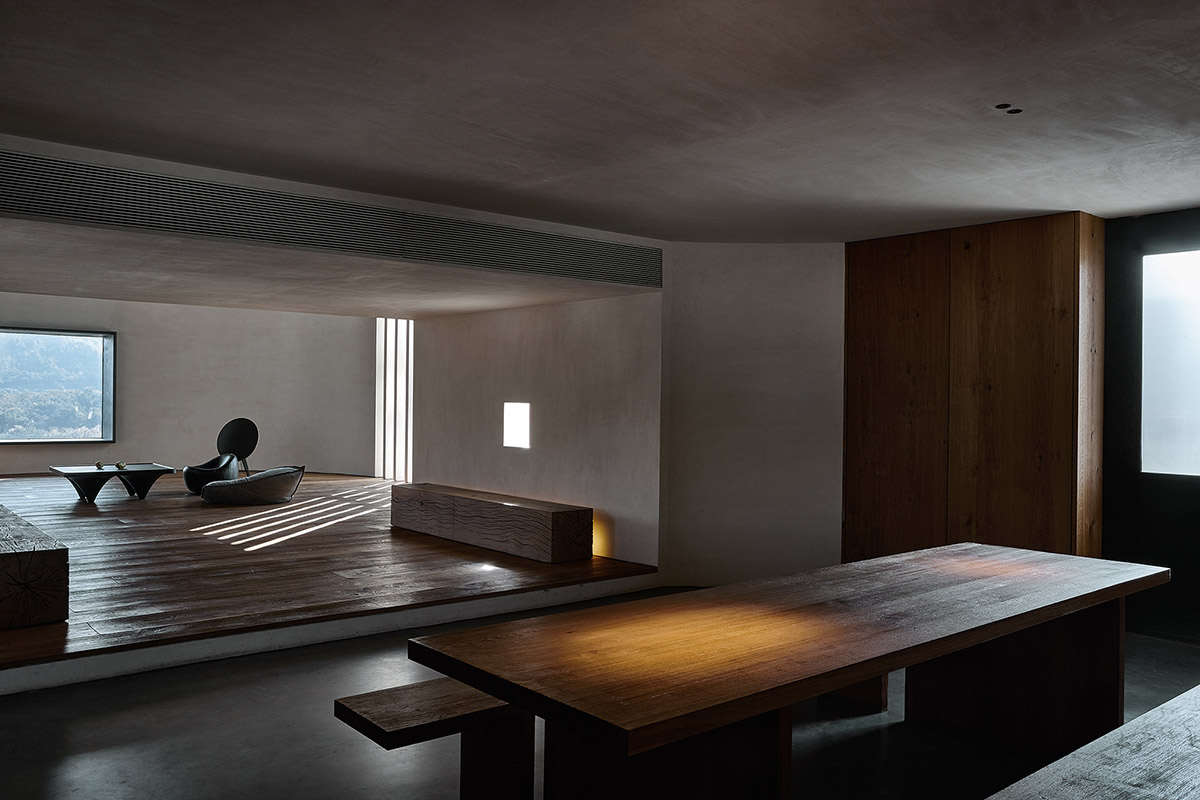 ZMY Design creates earth-toned interiors for a woodwork enthusiast’s house in Fujian, China