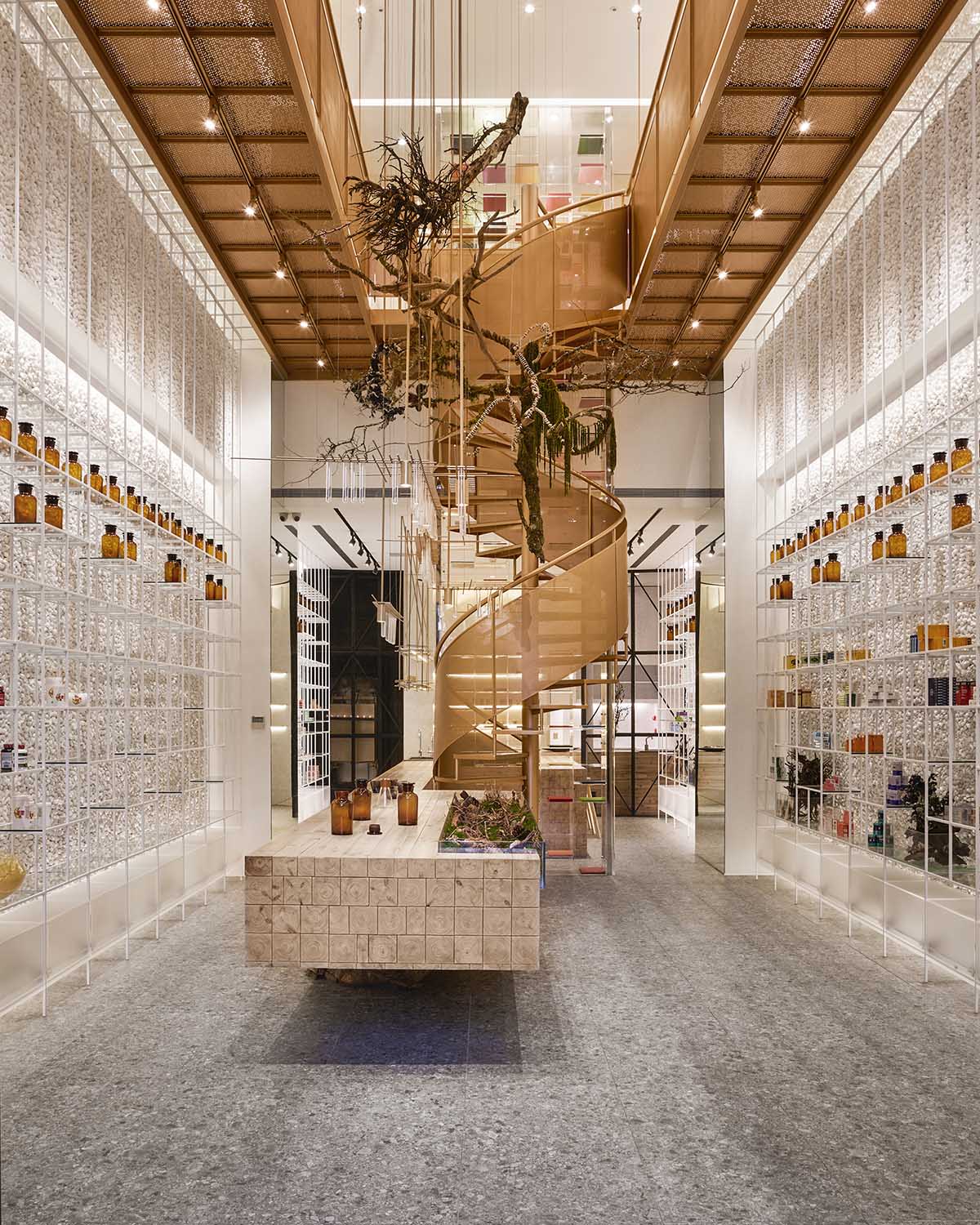 This pharmacy features varied spaces to experience different curing processes in artful environment