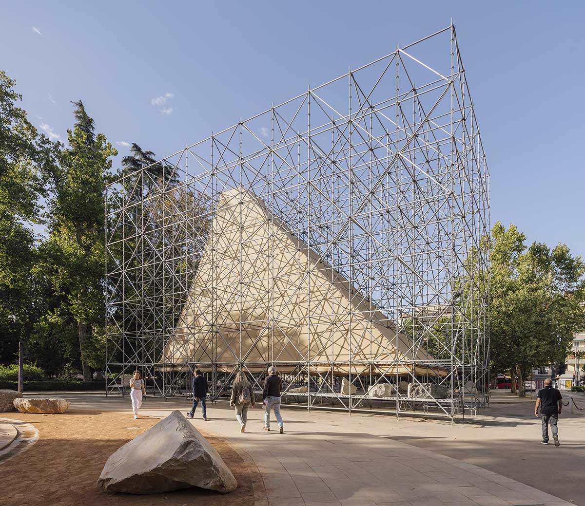 Aire Pavilion wrapped by giant scaffolding represents 