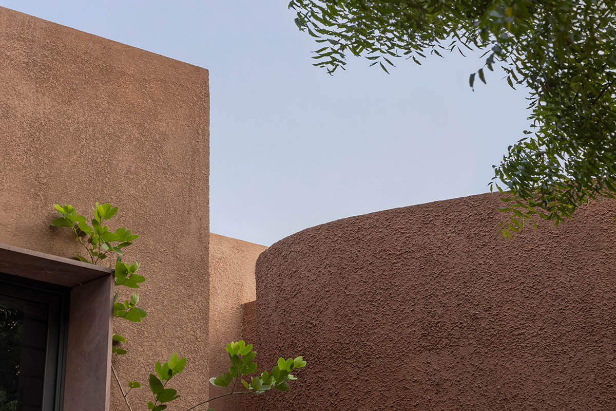 Farmhouse by Studio DesignSeed becomes a natural extension of its surroundings on Indian hills