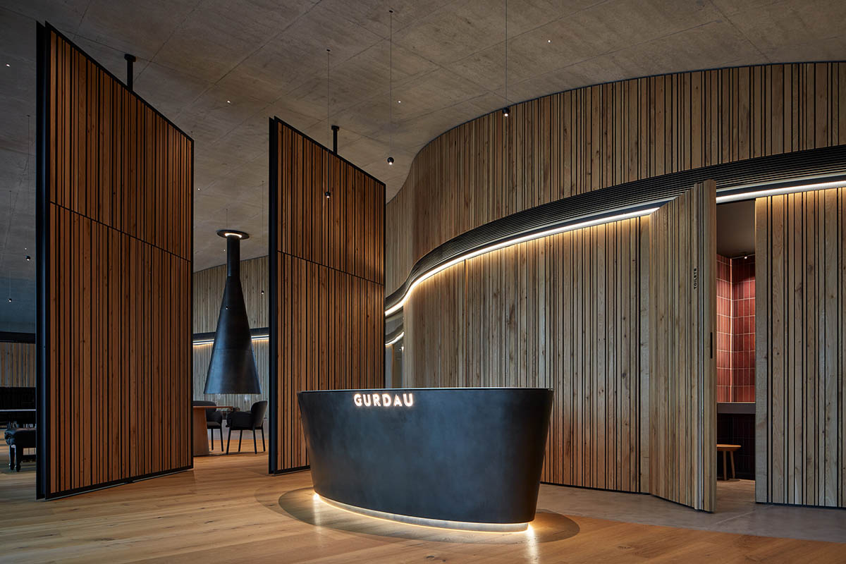 Curved green roof hides winery by Aleš Fiala in a rolling landscape in the Czech Republic