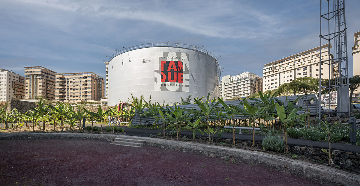 Menis Arquitectos repurposes former oil tank as a cultural space with new banana gardens in Spain  