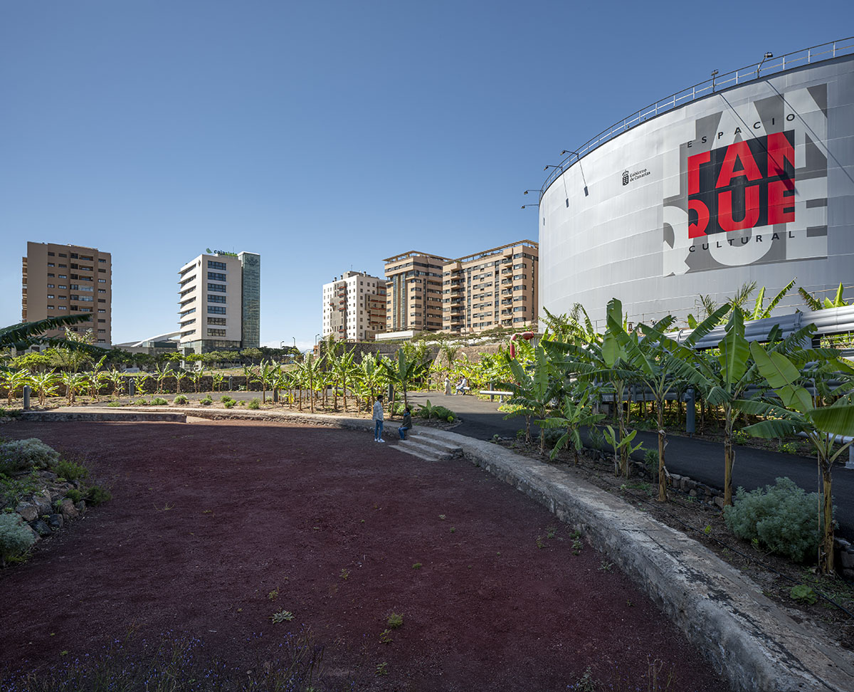 Menis Arquitectos repurposes former oil tank as a cultural space with new banana gardens in Spain  