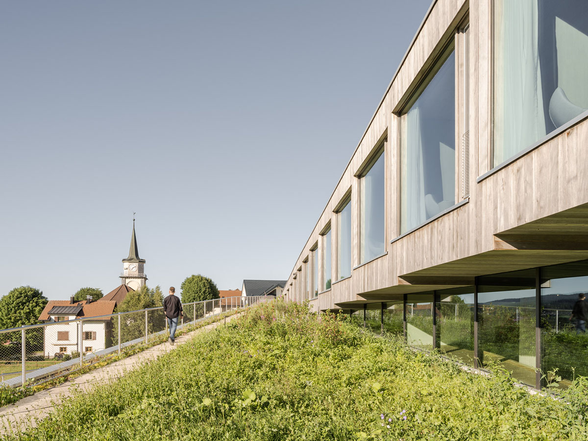 BIG reveals hotel with zigzagging slabs for watchmaker brand Audemars Piguet in Le Brassus