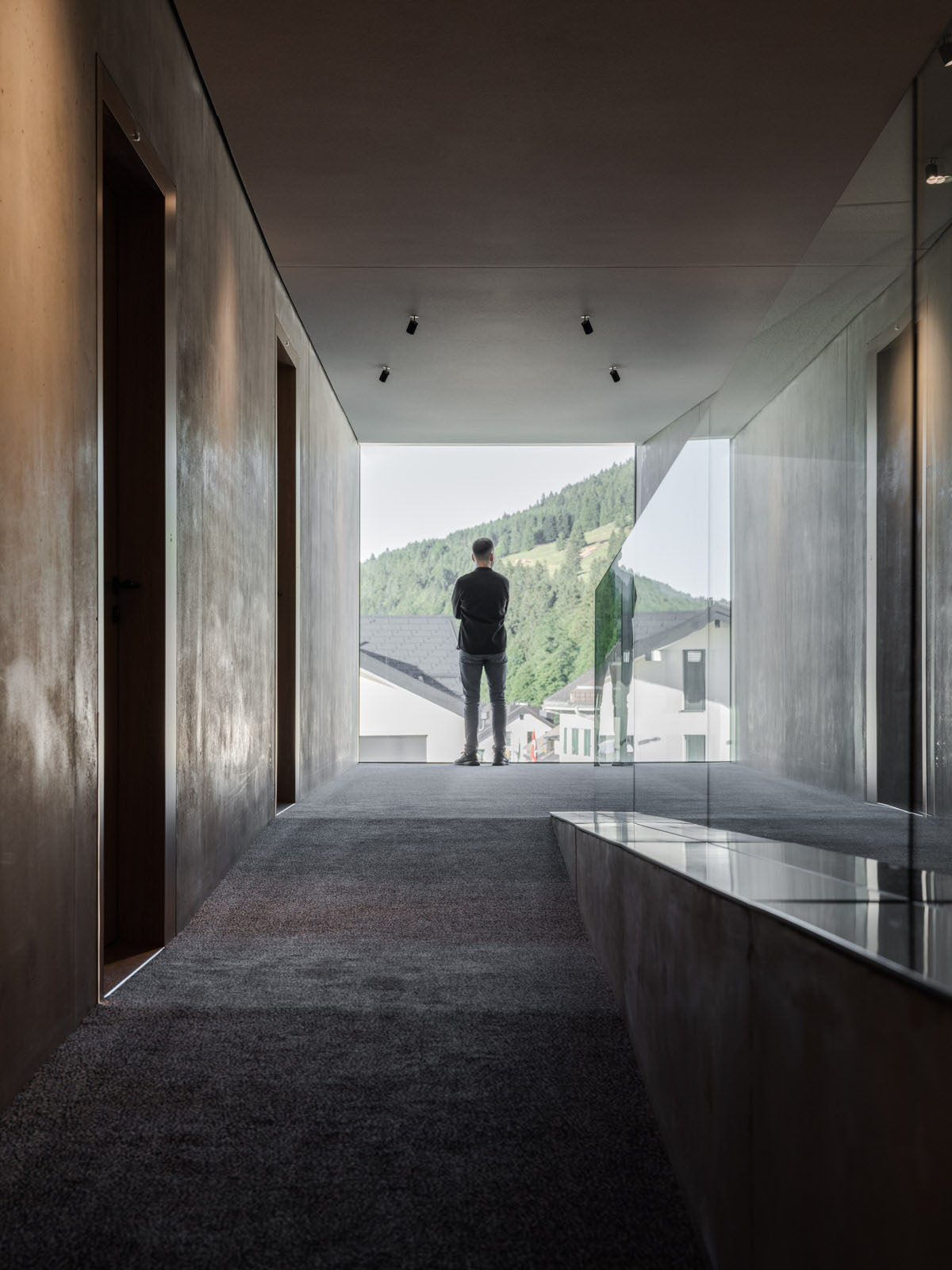 BIG reveals hotel with zigzagging slabs for watchmaker brand Audemars Piguet in Le Brassus