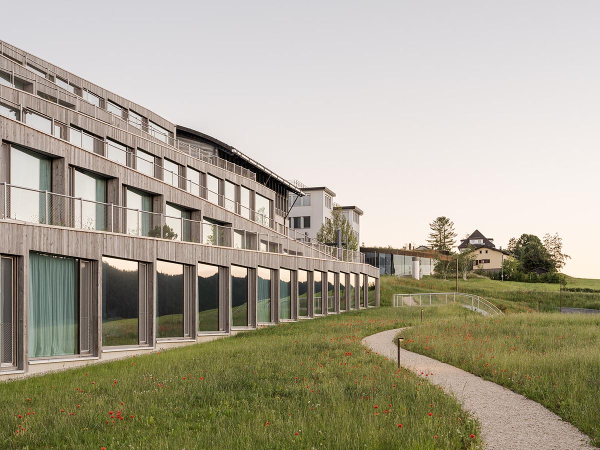 BIG reveals hotel with zigzagging slabs for watchmaker brand Audemars Piguet in Le Brassus