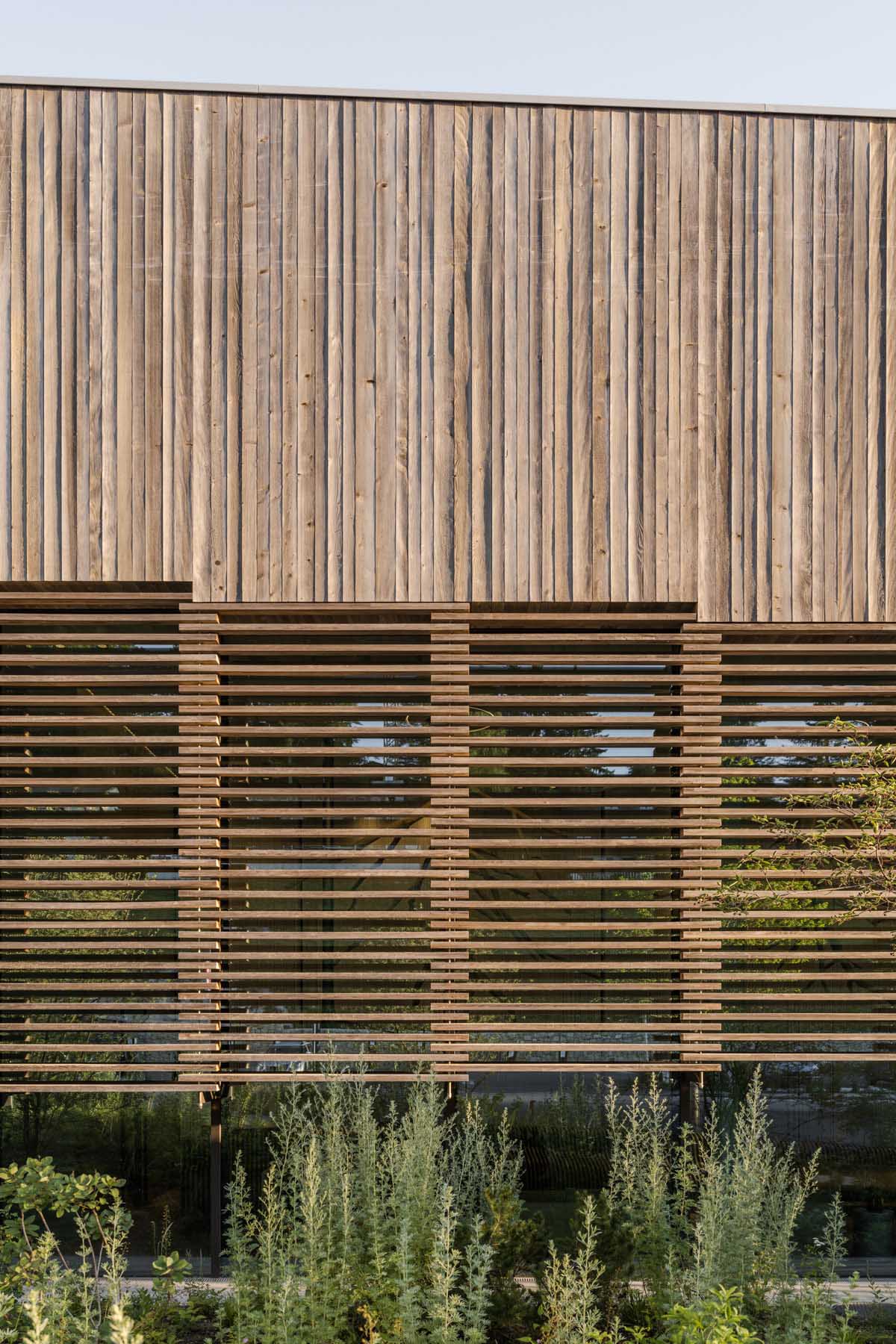 BIG reveals hotel with zigzagging slabs for watchmaker brand Audemars Piguet in Le Brassus