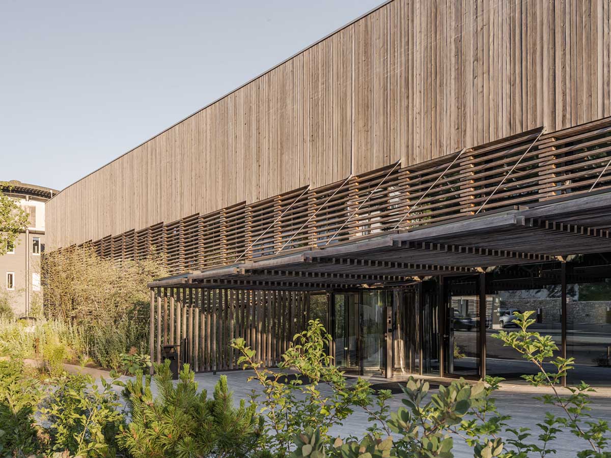 BIG reveals hotel with zigzagging slabs for watchmaker brand Audemars Piguet in Le Brassus