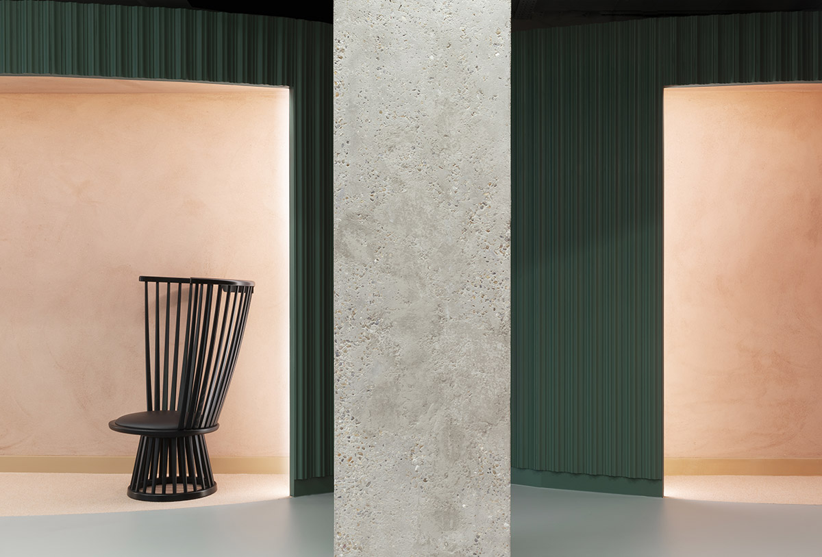 Office interiors by Bureau de Change Architects are shaped by colorful carved-out cylinders