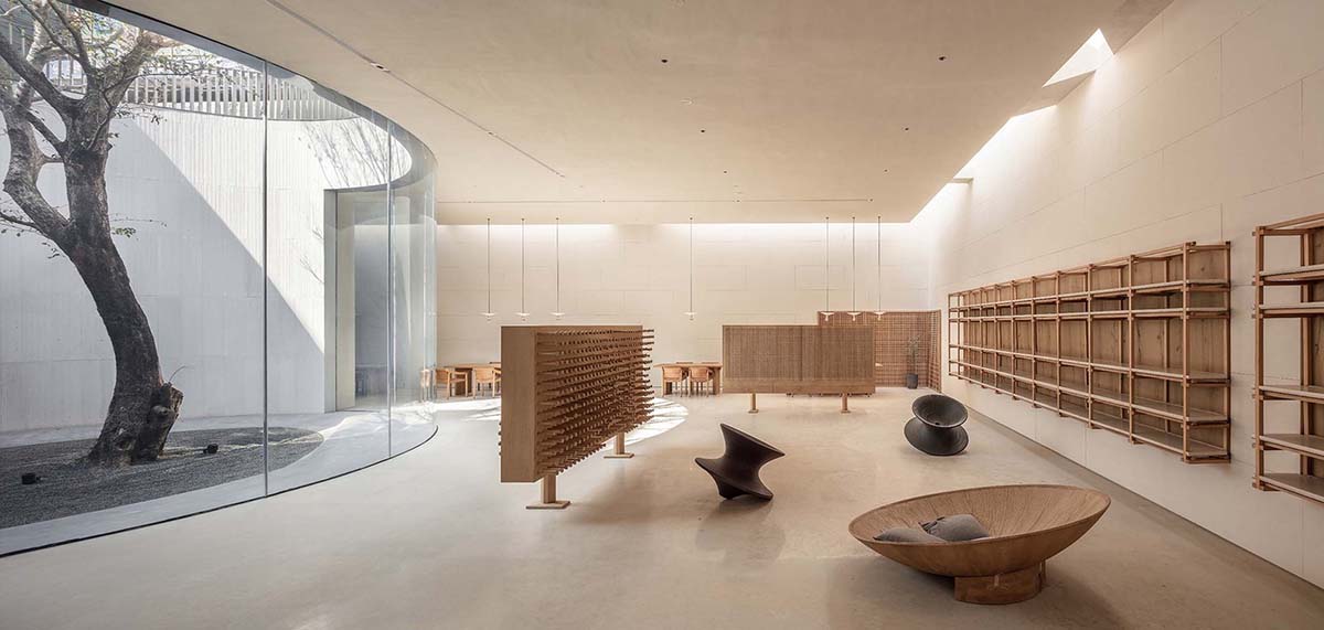 Waterfrom Design creates peaceful interior with wooden furnitures for tea community center in China
