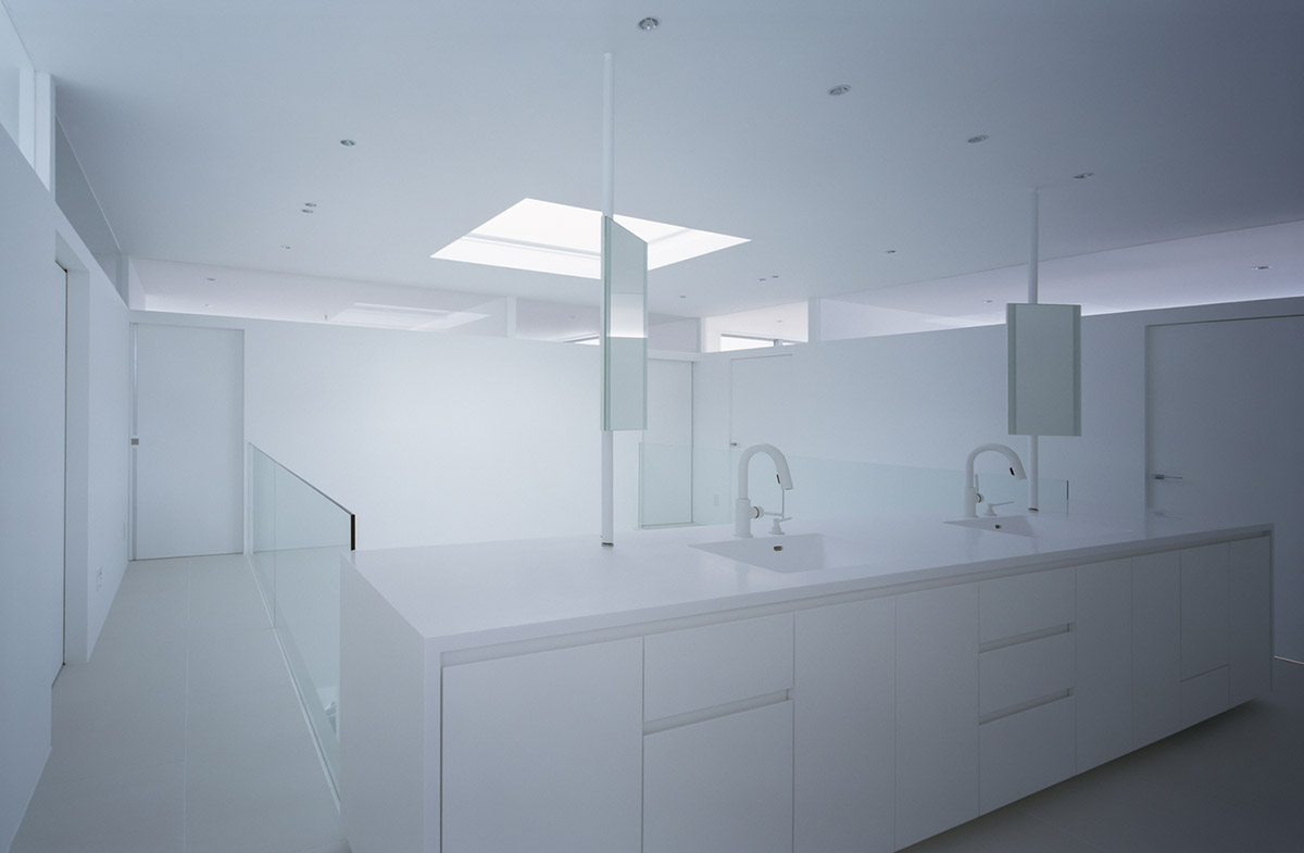 Fujiwaramuro Architects designs family house with thin skylights and transparent built-in garage