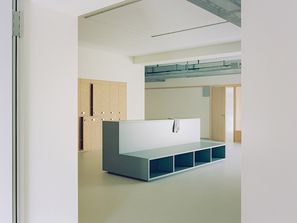 BDR bureau completes community school with pinkish steel framework in Turin