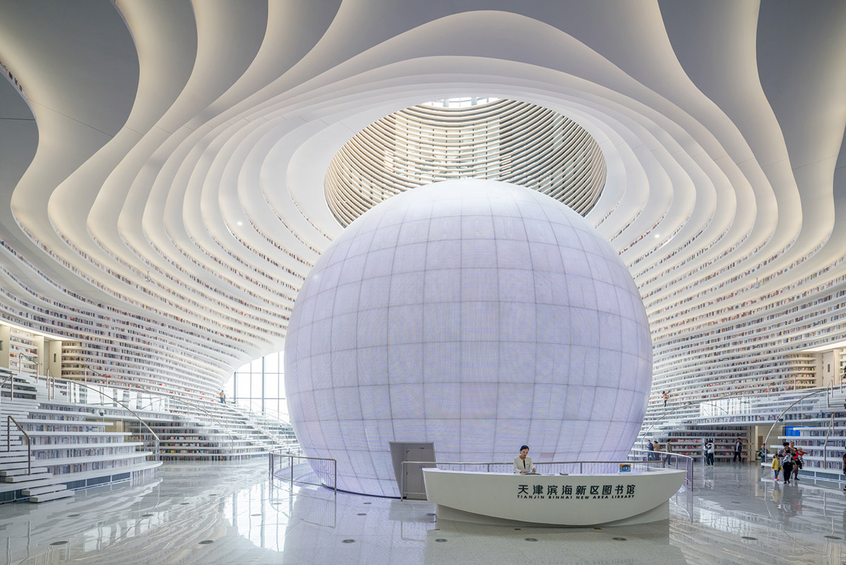MVRDV’s topographical Tianjin Binhai Public Library featuring millions of books opens in China