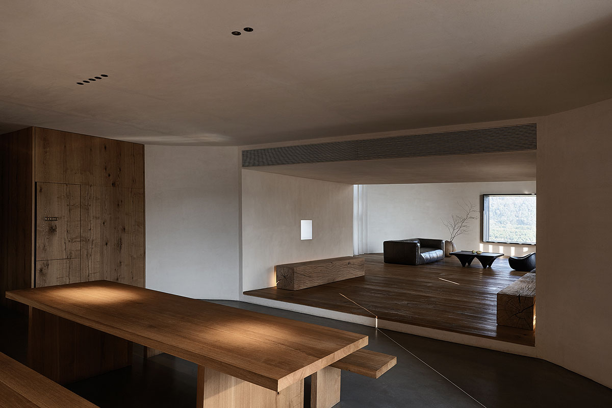 ZMY Design creates earth-toned interiors for a woodwork enthusiast’s house in Fujian, China