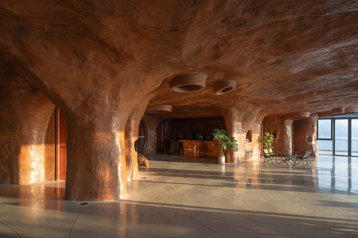 A gallery on a cliff features irregularly shaped lighting tubes that mimic marine creatures in China