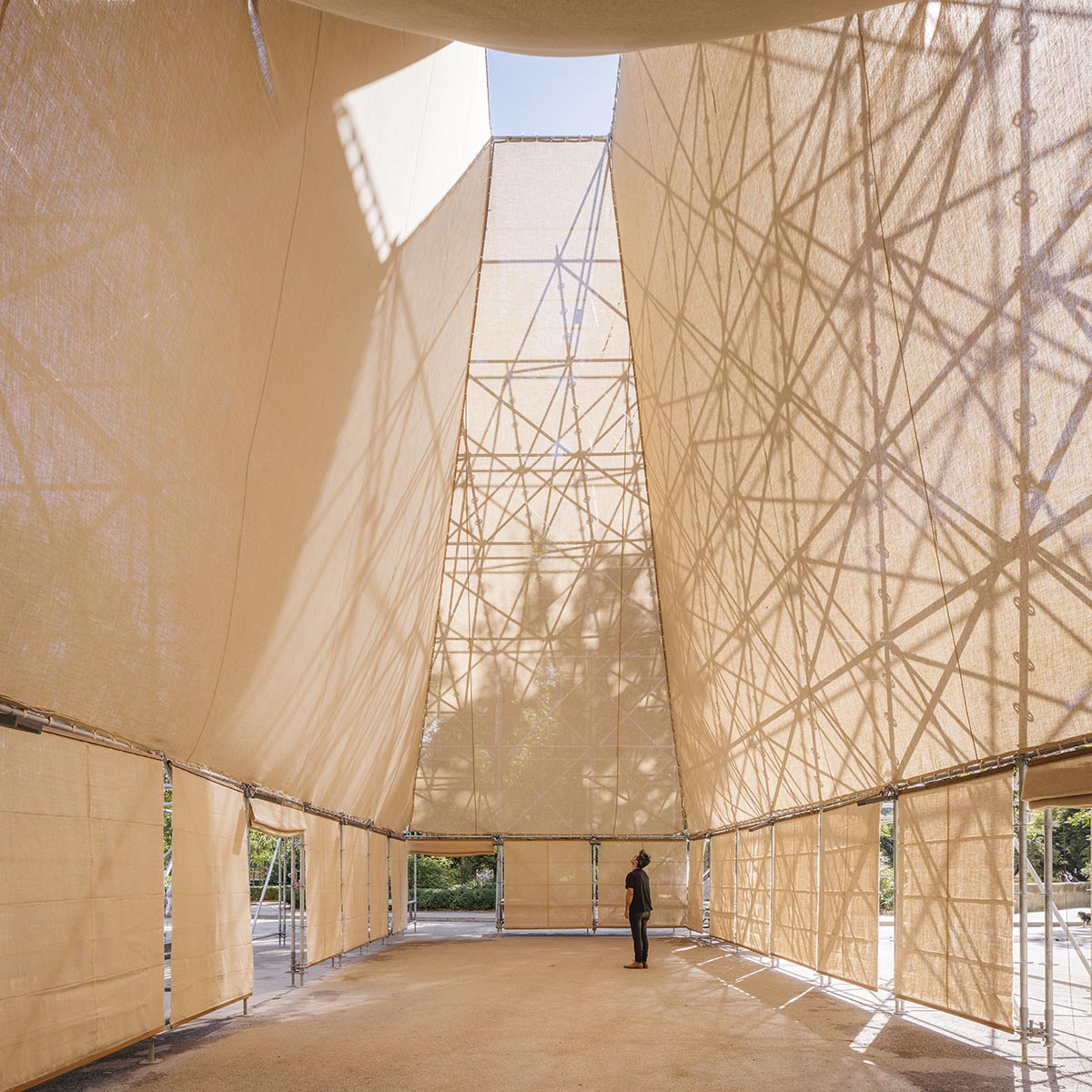 Aire Pavilion wrapped by giant scaffolding represents 