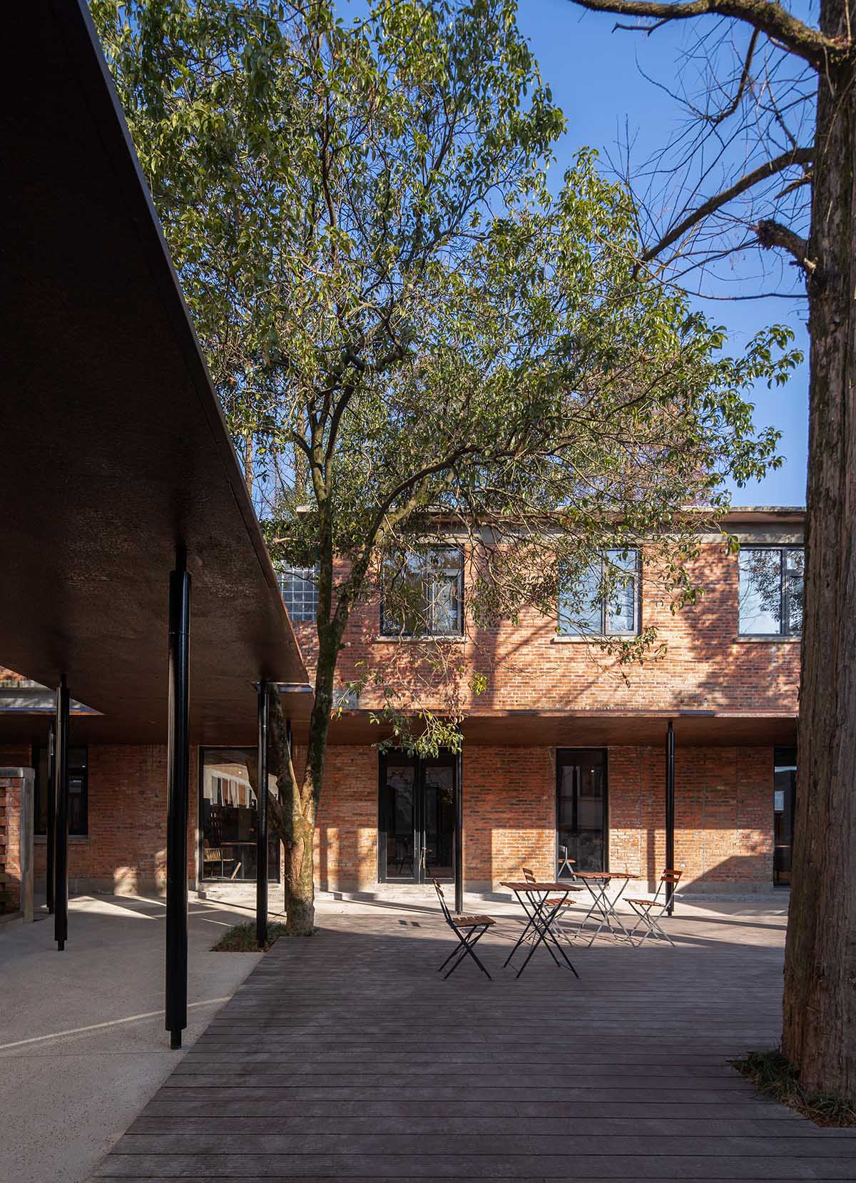 y.ad studio converts former hospital and old factory dormitories into homestay hotel in China