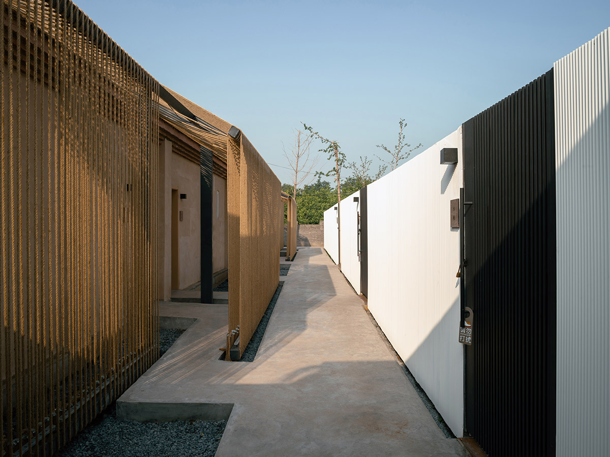 Domain Architects built boutique hotel with thatch roof and 60,000-metre hemp rope in rural Beijing