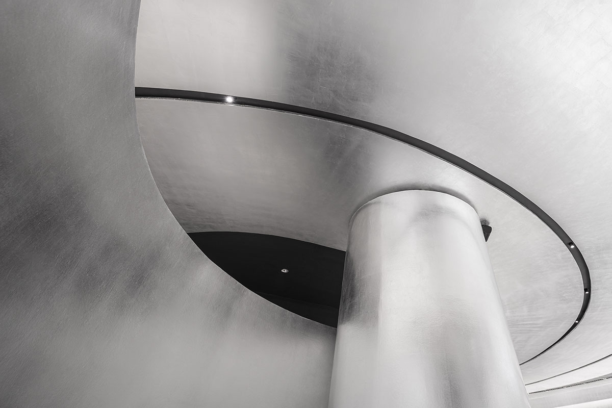 Various Associates designs beauty store with winding staircase and silver-toned interiors in Hangzhou