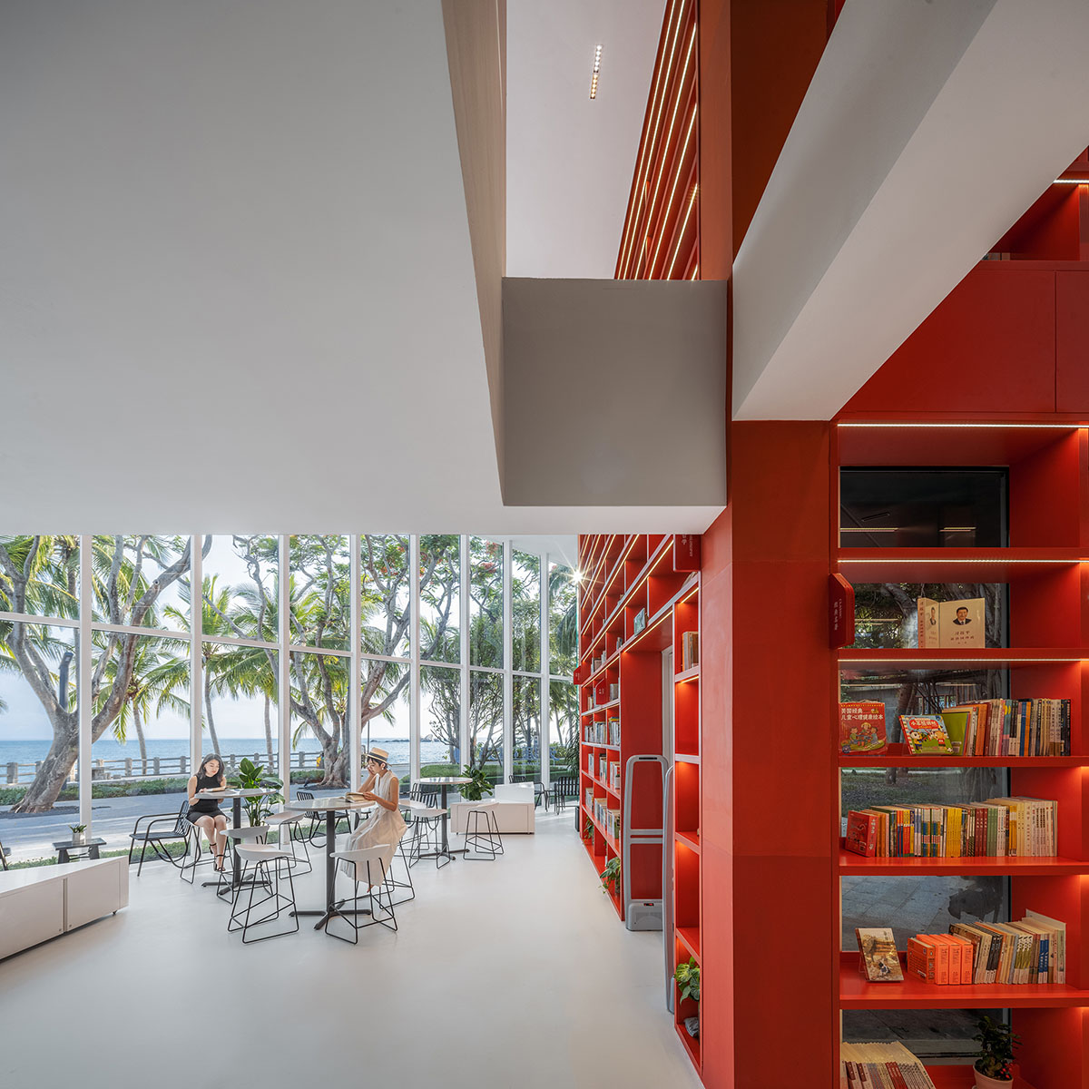 Wutopia Lab elaborates bookstore with red triangular bookshelves for Tianya Books in China 