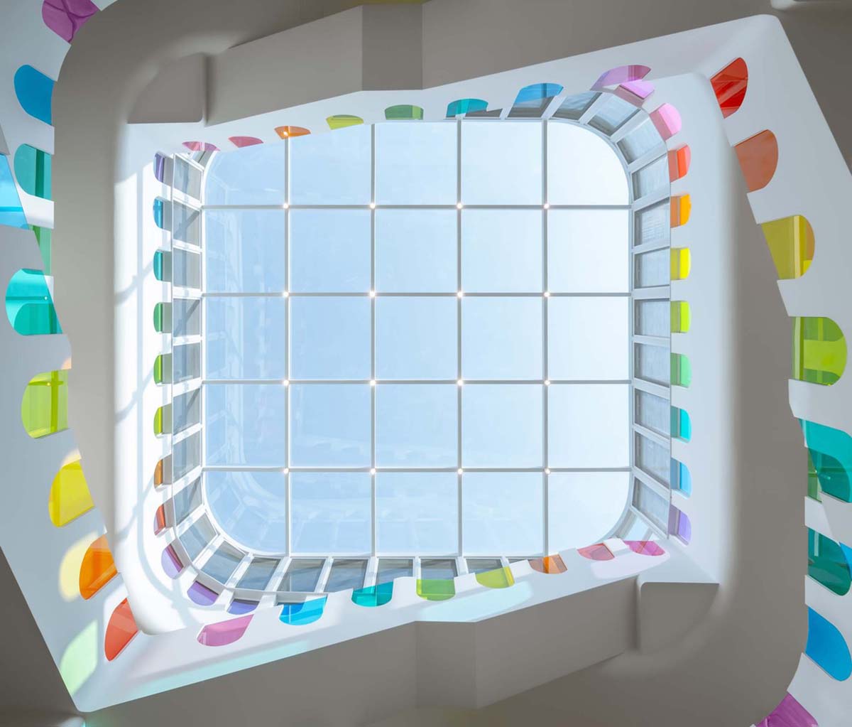 SAKO Architects designs colorful glass doors to evoke children's creativity in this school in China