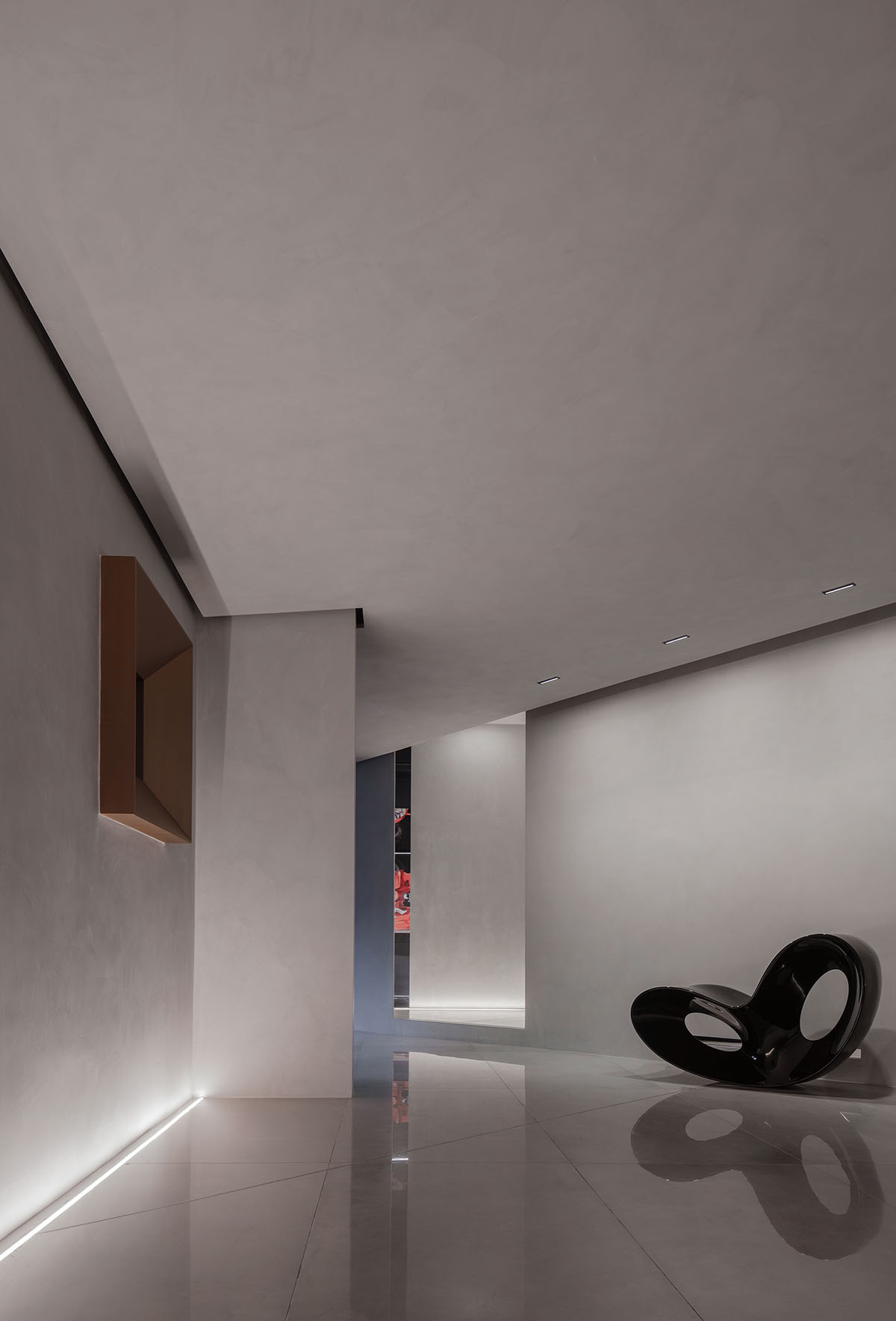 Masanori Designs' interiors include red cylinder bringing rainwater into the space